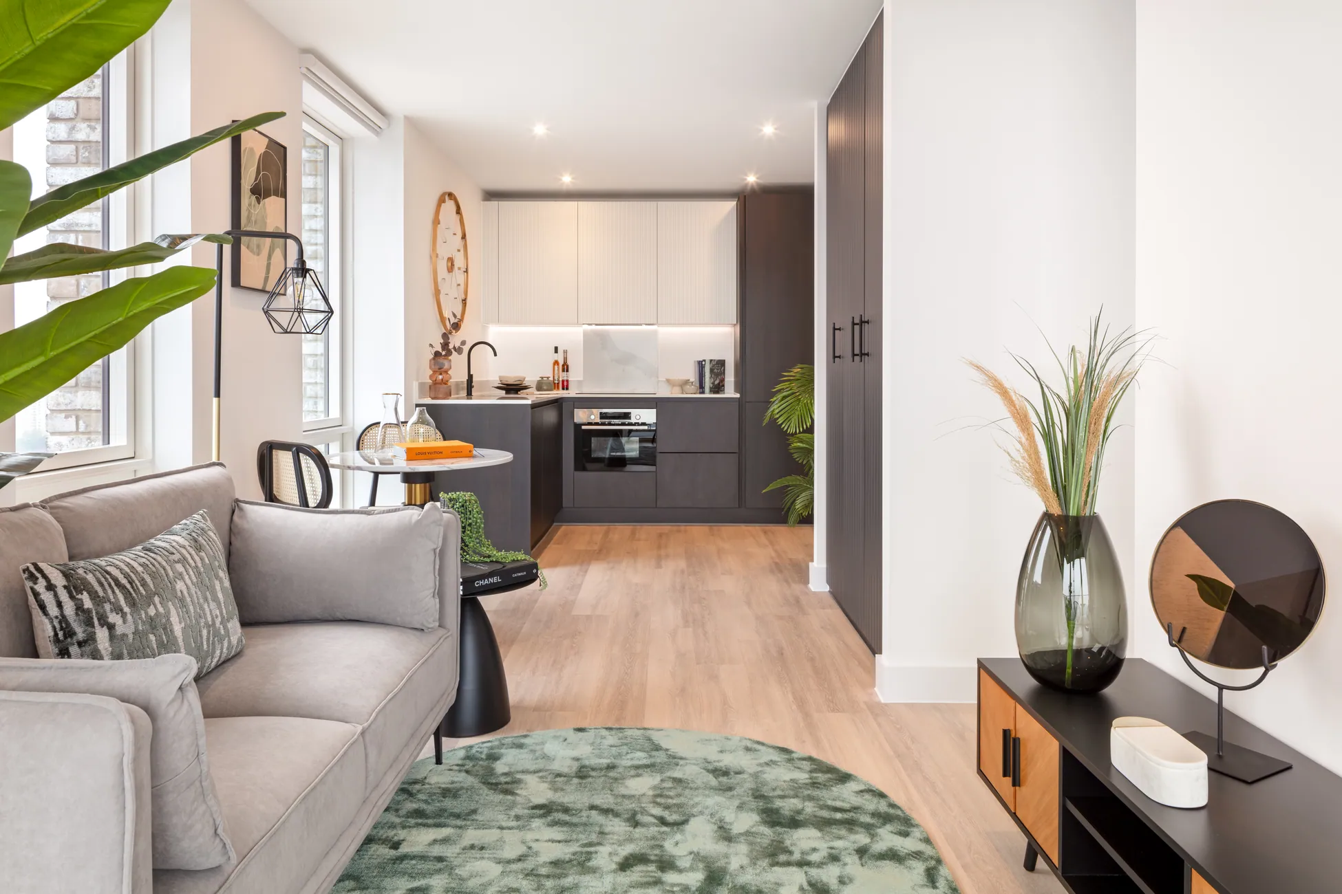 The Verdean Studio styled seating area looking towards the kitchen