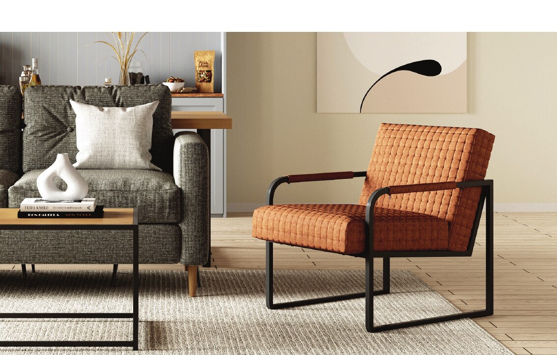 Close-up of a coordinated living room with an orange lounge chair